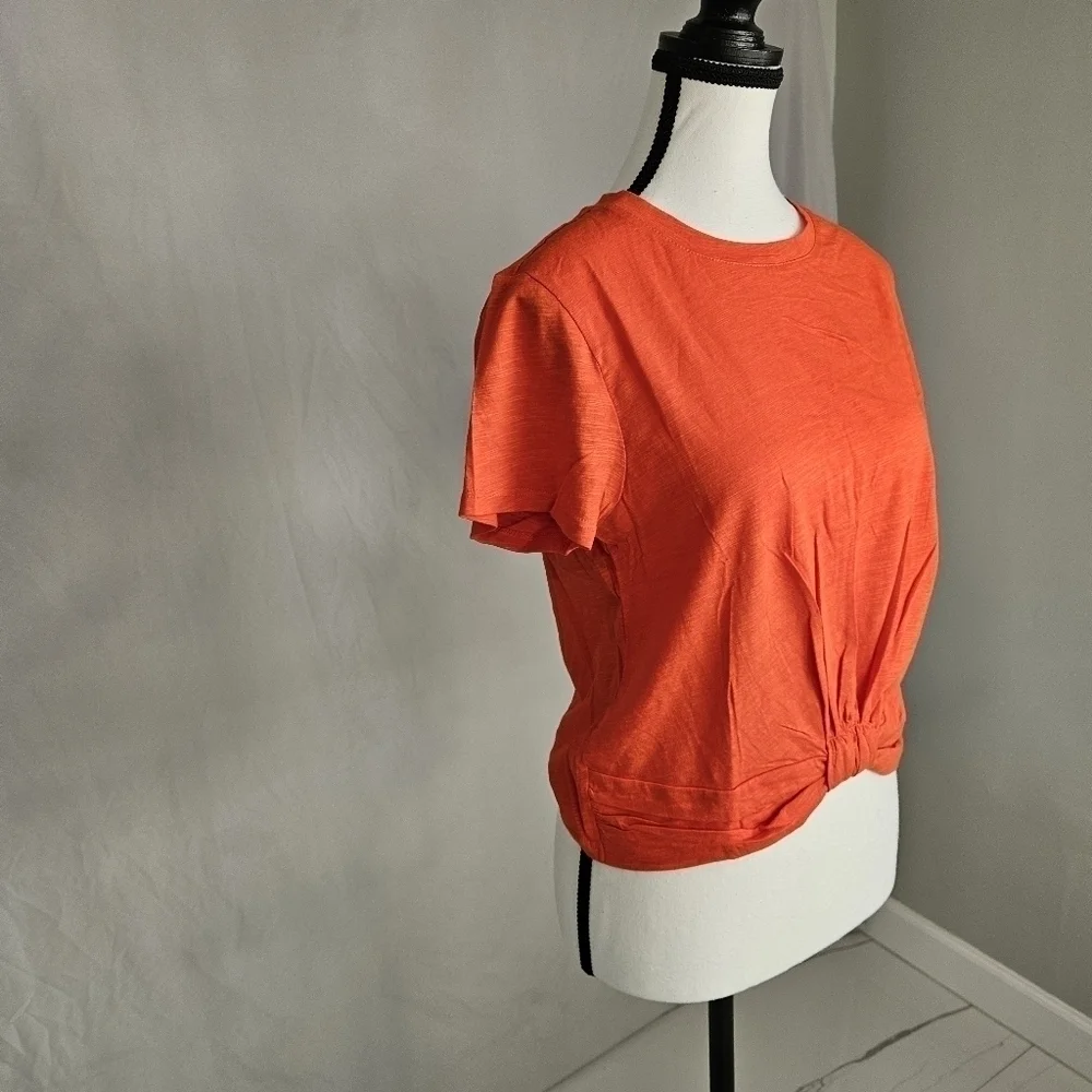 NWT ORANGE TOP SIZE MEDIUM